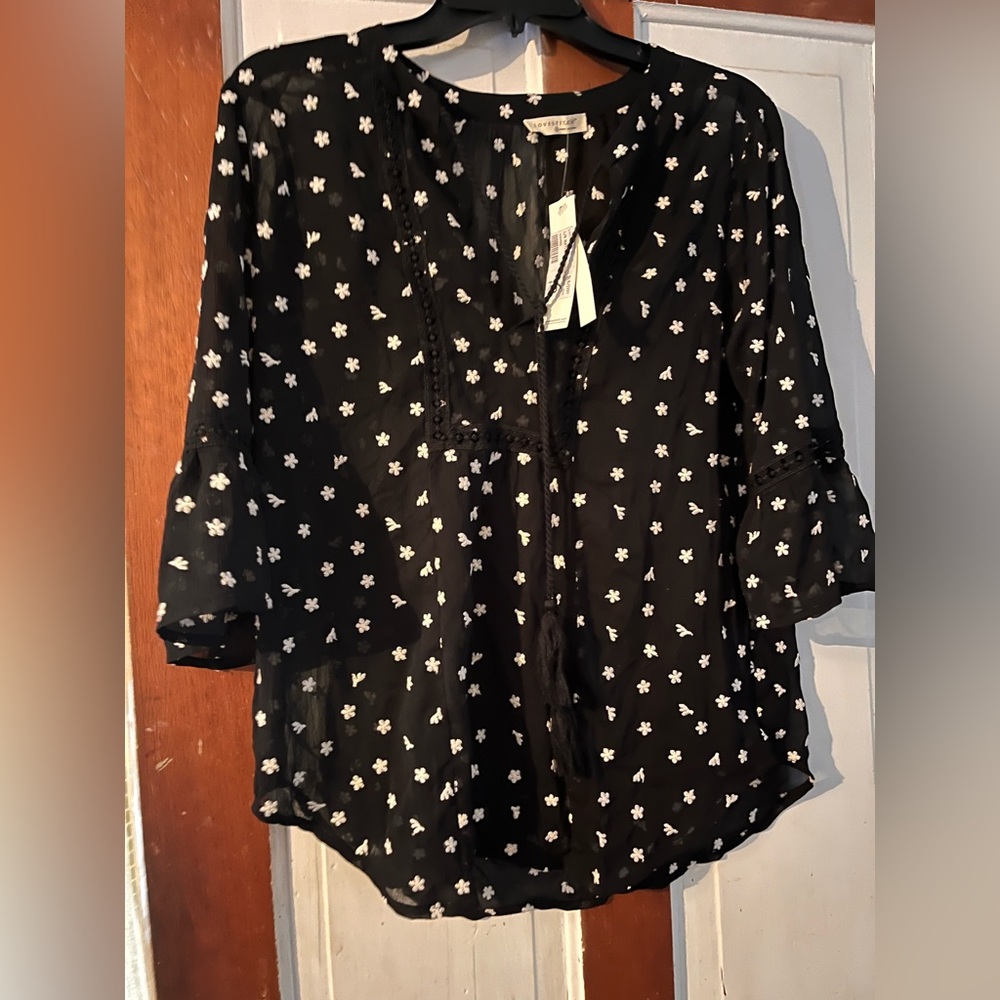 Women’s black sheer blouse with tank top lining